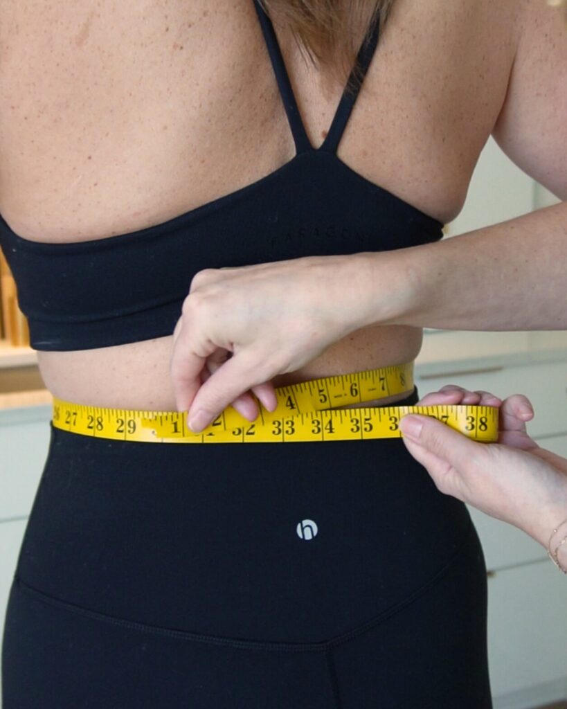 Photo of a Captivate patient getting her stomach measured 